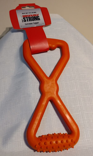 Tugging dog toy with a handle for the human hand and one for the dog's mouth.